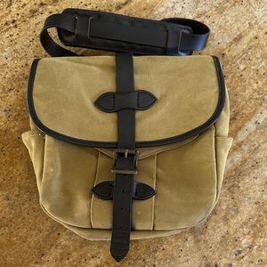 Filson tan leather rugged field bag in twill